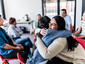 women hugging